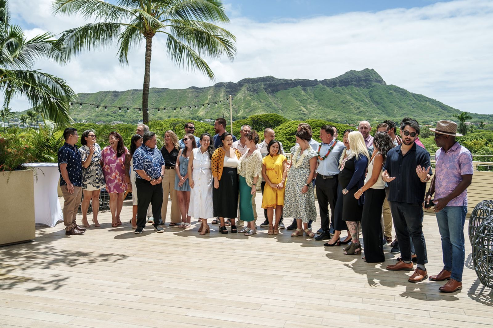 Kama'aina Mortgage Group team gathering with Diamond Head in the background